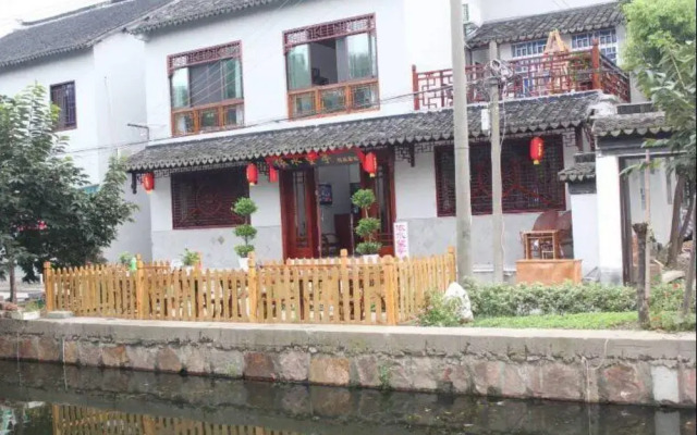 Отель Zhouzhuang Wangjiangting Hostel Китай, Сучжоу - отзывы, цены и фото номеров - забронировать отель Zhouzhuang Wangjiangting Hostel онлайн вид на фасад
