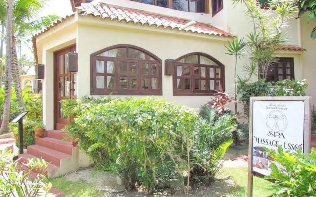 Отель Los Corales Villas Ocean Front Доминикана, Пунта Кана - отзывы, цены и фото номеров - забронировать отель Los Corales Villas Ocean Front онлайн вид на фасад