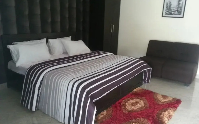 Отель Queen Idia Suites комната для гостей