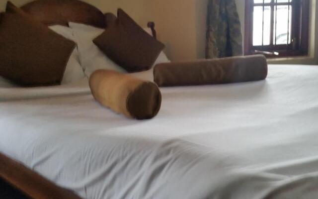 Отель Nuwara Eliya Colonial Bungalow комната для гостей