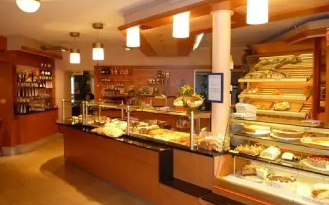 Ferienwohnung Café Escher