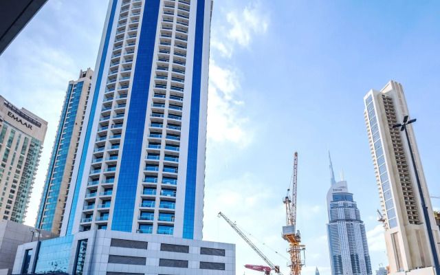 Апартаменты One Perfect Stay Studio Burj Al Nujoom вид на фасад