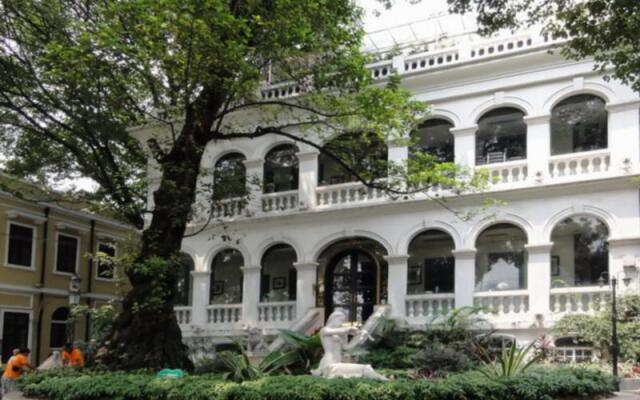 Отель Guangdong Oversea Chinese Hotel Китай, Гуанчжоу - отзывы, цены и фото номеров - забронировать отель Guangdong Oversea Chinese Hotel онлайн вид на фасад