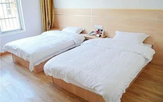 Xingainian Business Hotel