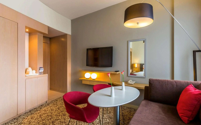 Отель Novotel Suites Mall Avenue Dubai