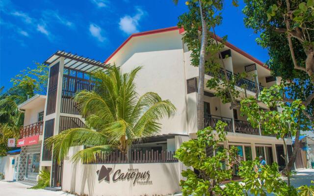 Гостевой Дом Canopus Retreat Thulusdhoo Остров Гасфинолу вид на фасад