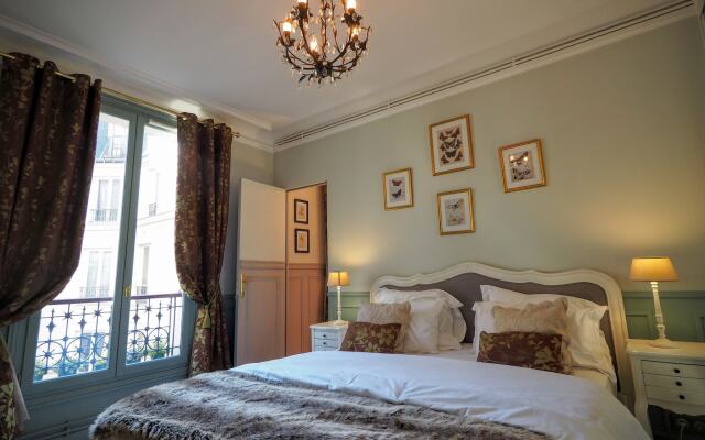 Отель Louvre Elegant ChicSuites комната для гостей