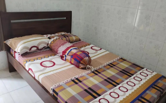 OYO 91233 Bismo 85 Family Syariah