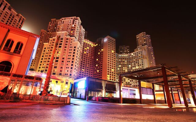 Отель Amwaj Rotana - Jumeirah Beach Residence вид на фасад