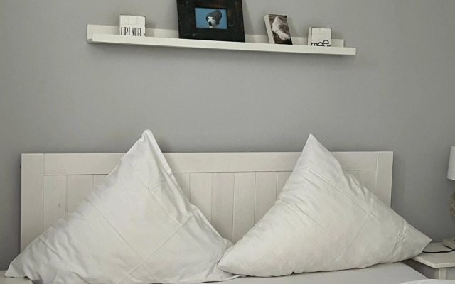 Strandvogt - wunderschöne Ferienwohnung mit Parkettboden und Sonnenbalkon