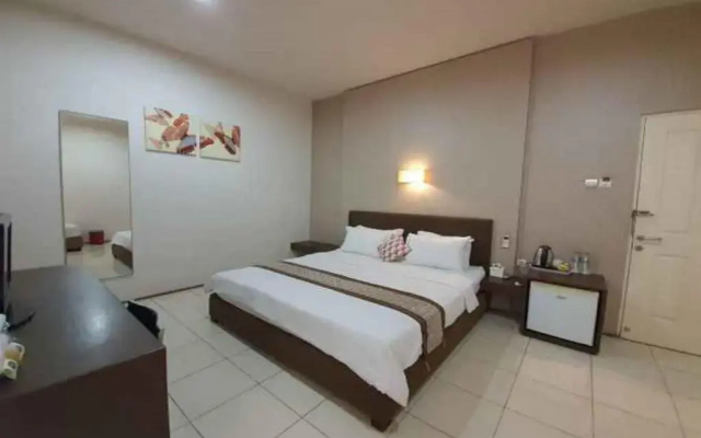 OYO 90075 Feliz Hotel