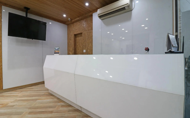 Capital O 7743 Hotel Hiland International
