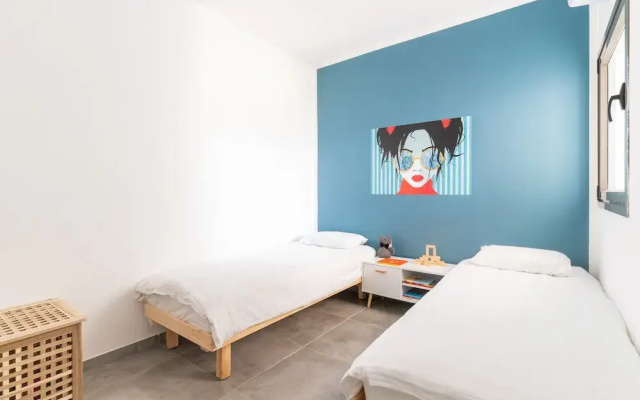 Vibrant Seaside Stay with Balcony by Sea N' Rent
