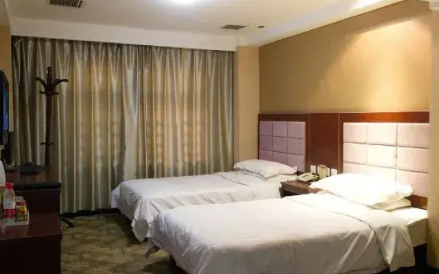 Qi Jinbaihui Business Hotel