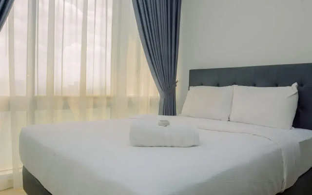 Comfy and Spacious 2BR The Masterpiece Epicentrum Apartment By Travelio