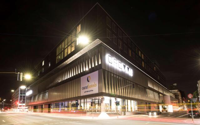 Отель Carathotel Dusseldorf City Дюссельдорф вид на фасад