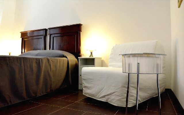 Отель Maison Colosseo Рим комната для гостей