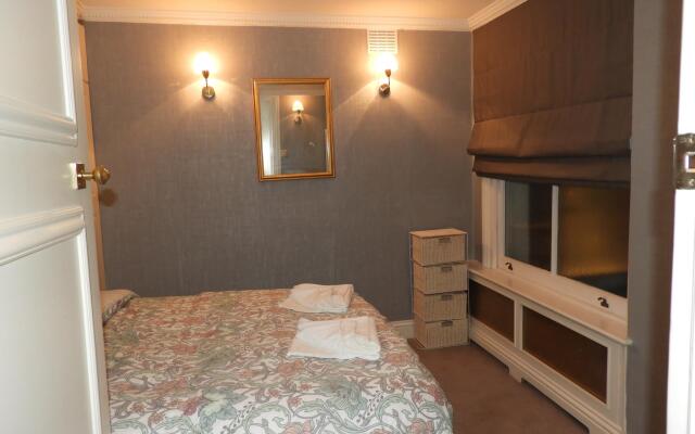 Отель Knightsbridge 1 bed Лондон комната для гостей