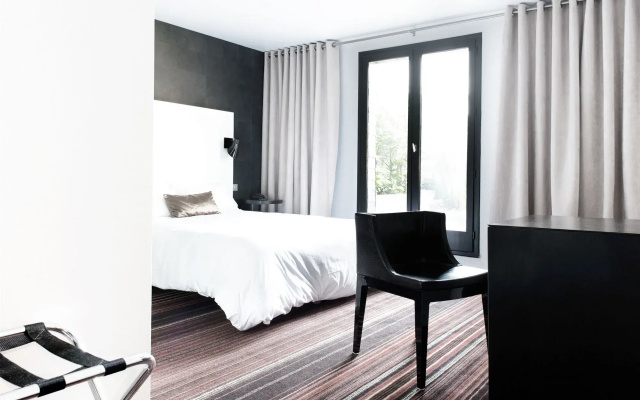 L'Hôtel - Face au Château - Boutique Hôtel et Séminaires