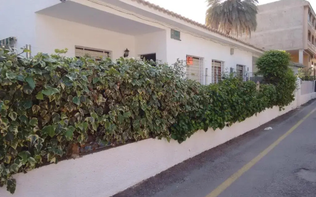 Chalet II con jardín y wifi en la playa