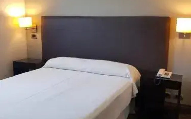 Hotel Tejas Rojas