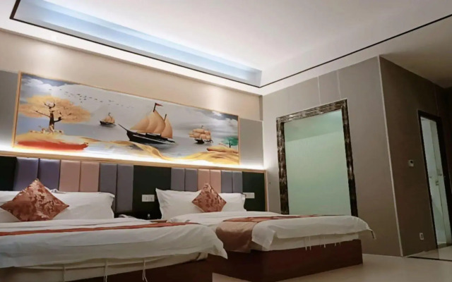 Q+ Nanxiong Xinhewan Business Hotel