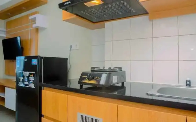 New Furnsihed Studio Room Apartment at Springlake Bekasi By Travelio