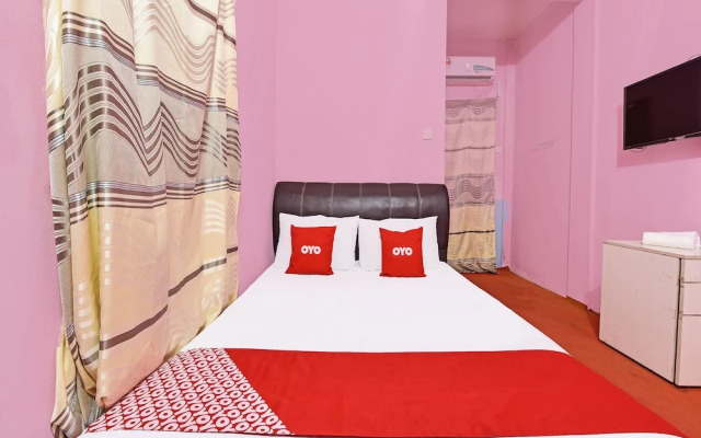 Capital O 90664 Rabi Hotel
