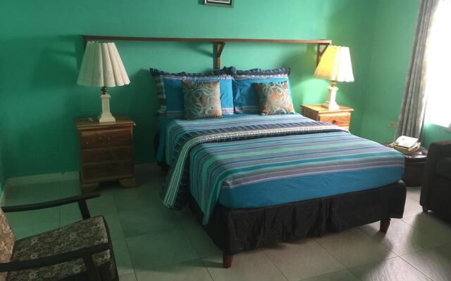 Отель Sunset Beach Studio At Montego Bay Club Resort Ямайка, Монтего-Бей - отзывы, цены и фото номеров - забронировать отель Sunset Beach Studio At Montego Bay Club Resort онлайн комната для гостей