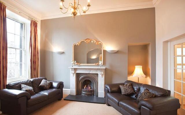 Апартаменты Greyfriars Apartments - Parliament Square Эдинбург комната для гостей