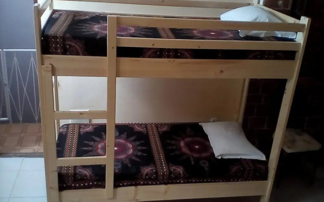 Room in Guest Room - Bed in Mixed Dormitory Room in Vila do Maio