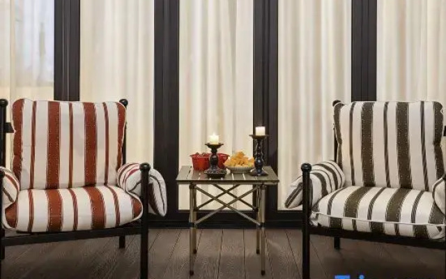 Jingdezhen Taomingju Garden Hotel (Tao Yang Alley People's Square)