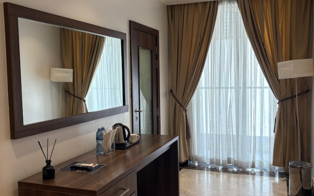 Boardroom Apartment  by Jotani Living