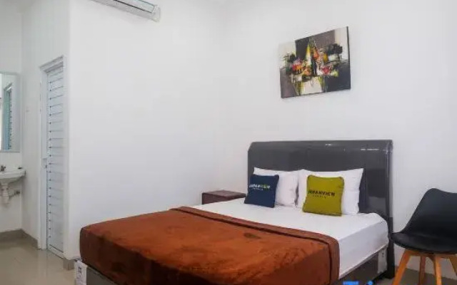 Urbanview KeTemon Hotel & Resto Yia by RedDoorz