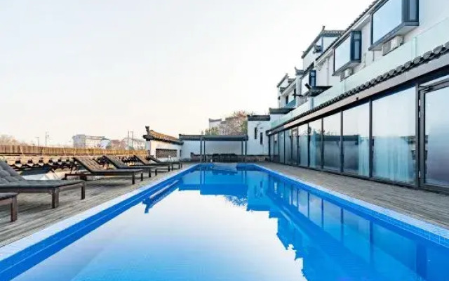 Grand Travel Lodge DESIGN Boutique Hotel(Xixi Nangu Village)