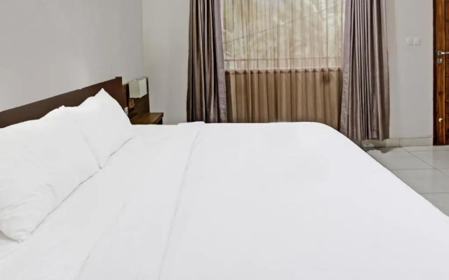 OYO 91696 Kimara Homestay & Resto