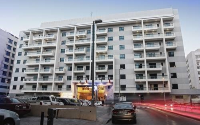 Отель Capitol Reseidence Dubai ОАЭ, Дубай - отзывы, цены и фото номеров - забронировать отель Capitol Reseidence Dubai онлайн вид на фасад