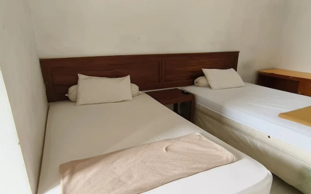 Hotel O Wisma Hamalau SyariahNearPulau Bromo Pedestrian Bridge