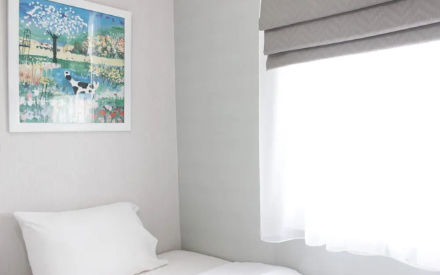 Warm 2BR Apartment at Parahyangan Residence