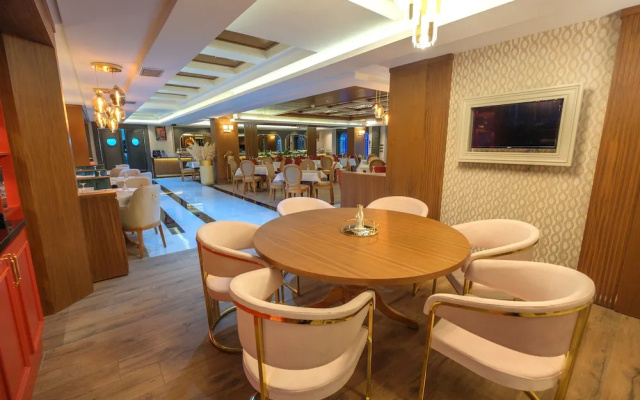 Отель Elysium Deluxe Suites