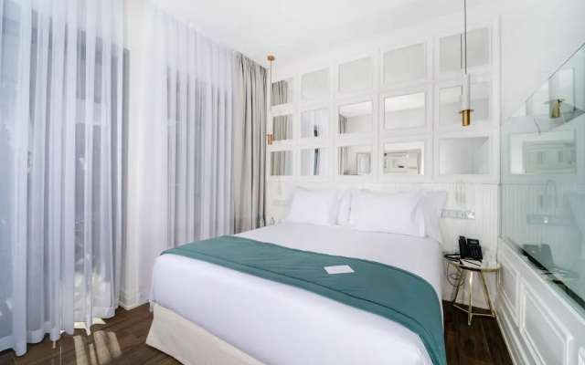 Отель Petit Palace Suites Hotel