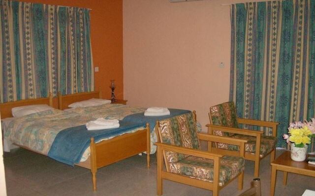 Отель Rantzo Holiday Apartments Кипр, Писсури - отзывы, цены и фото номеров - забронировать отель Rantzo Holiday Apartments онлайн комната для гостей