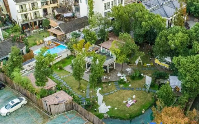 NA NIAN WAN CUN Courtyard GetawayHOME INN