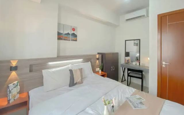 Minimalist 1Br Apartment At Vittoria Residence