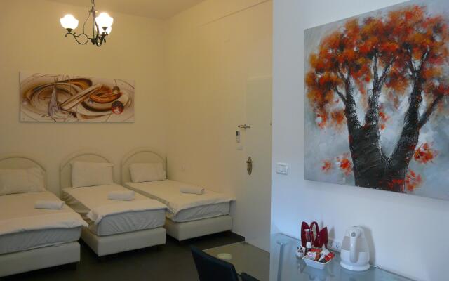 Апартаменты Loui M Apartments Хайфа комната для гостей
