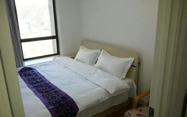 Yingxiang Hotel(大连星海映像酒店式公寓（星海广场地铁口店）)