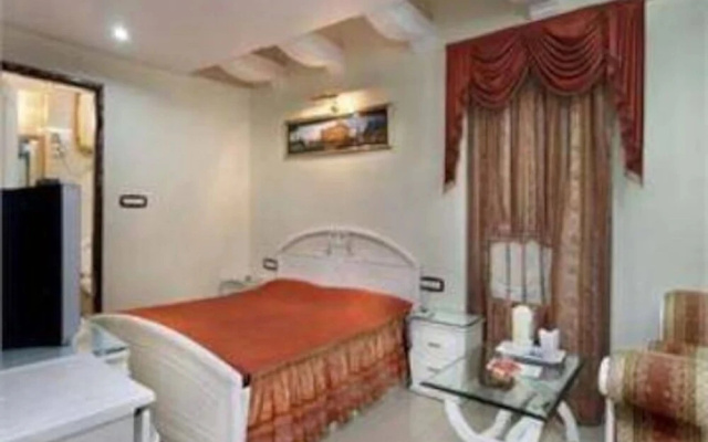 Hotel Manglam Kanpur by Goroomgo