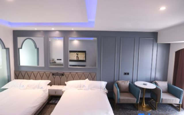 Qingguo Light Luxury Hotel (Wanda High Speed Railway Station)