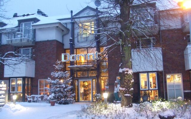 Отель Dorint Strandresort & Spa Ostseebad Wustrow вид на фасад