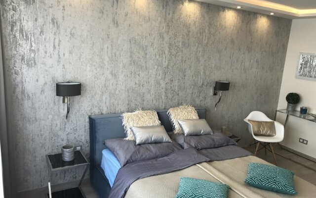 Апартаменты Dfive Apartments - Danube Corso комната для гостей